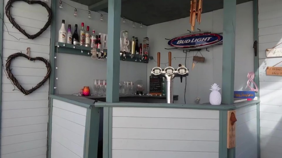 The outdoor bar is Sue's favourite spot in the garden