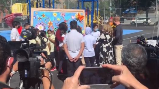 Meghan was seen hugging kids at a mural painted by the pupils