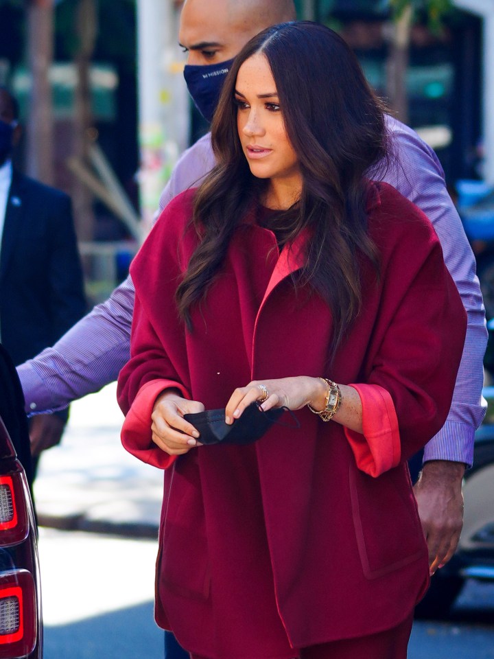 The Duchess wore a full red outfit to the school in Harlem