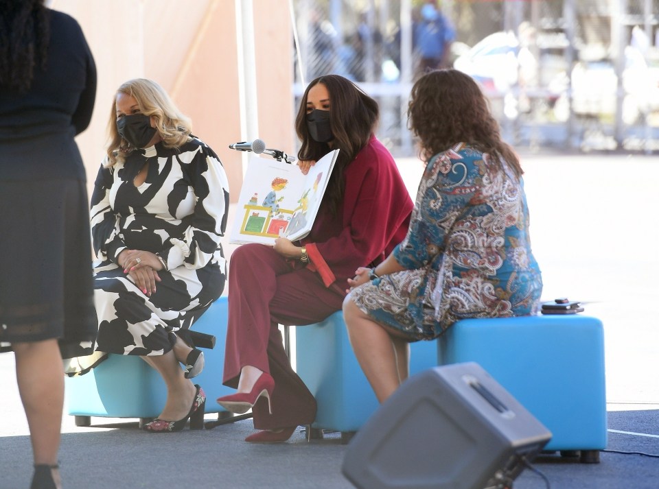 The Duchess shows off the illustrations from The Bench