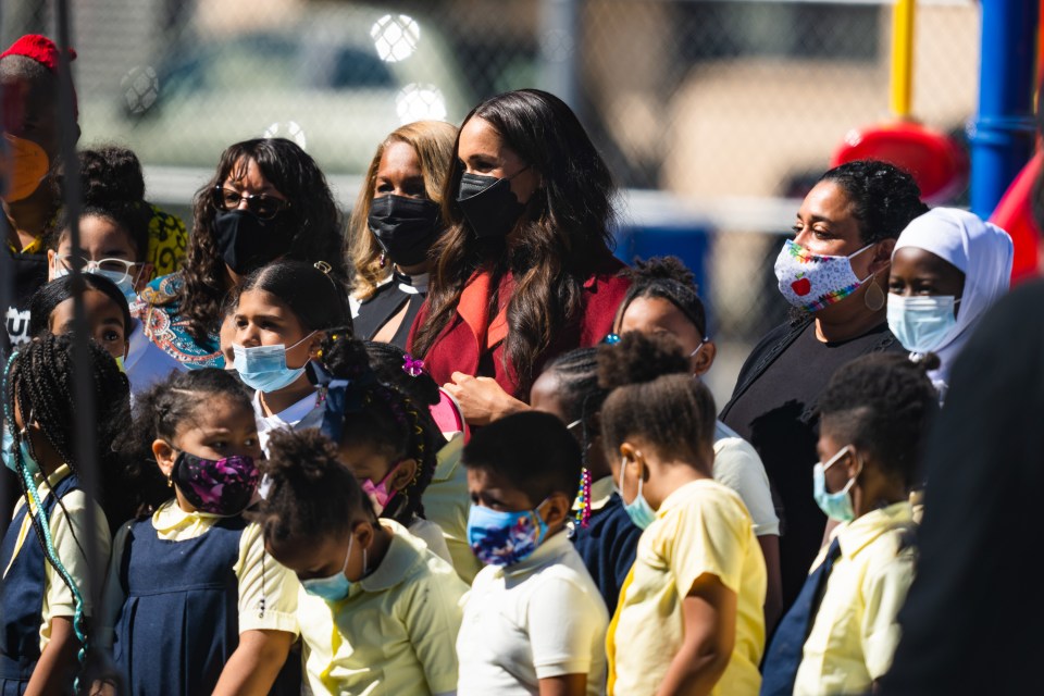 Meghan met pupils at a Harlem school to read her book