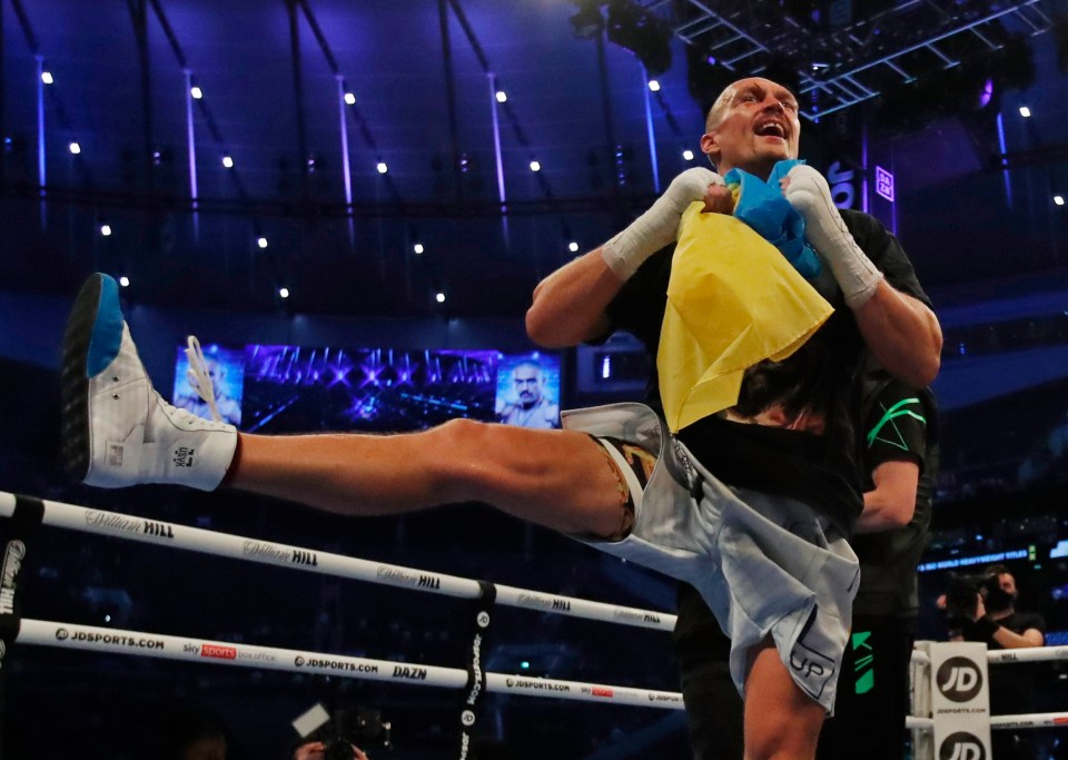 Usyk danced in delight with the Ukrainian flag after beating Joshua