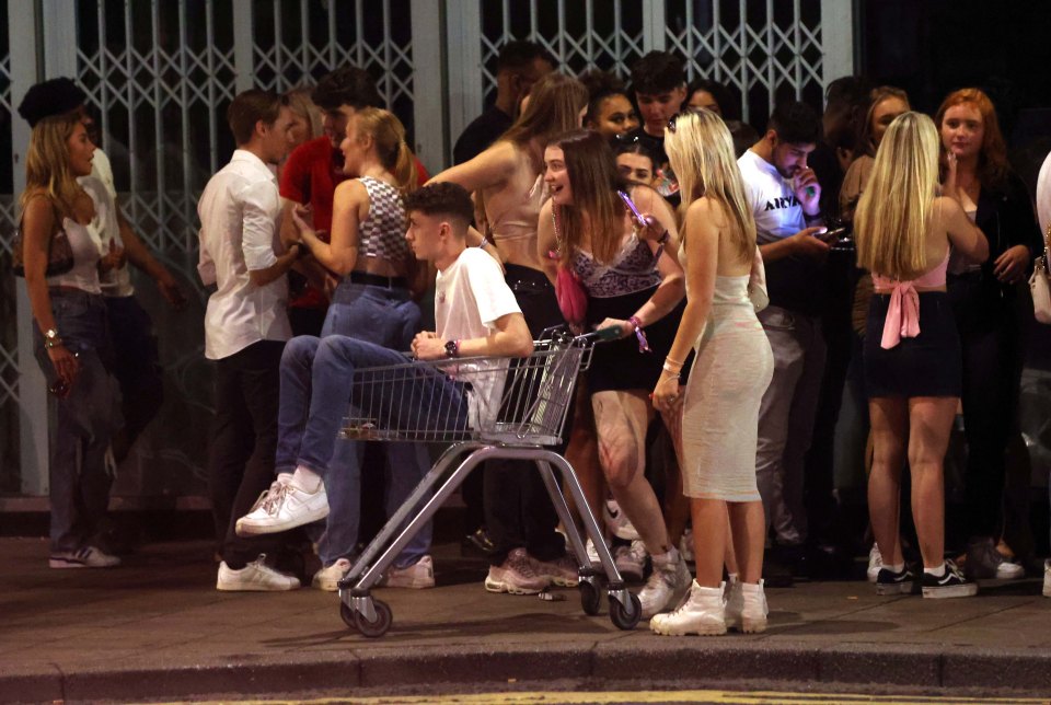 Students pushed each other around in trolleys to get around