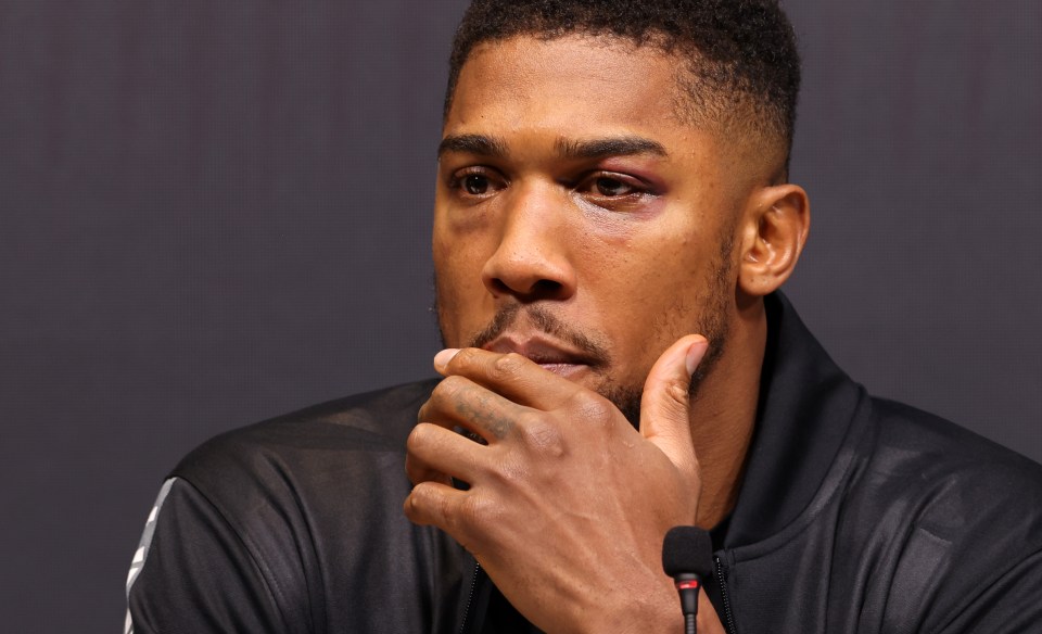 Anthony Joshua’s eye looks swollen at the post-fight press conference