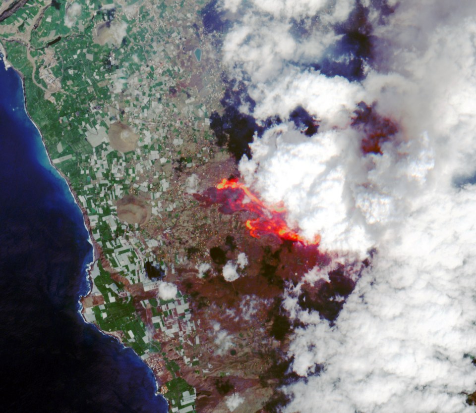 A satellite view shows lava flow following the eruption of a volcano on the island of La Palma