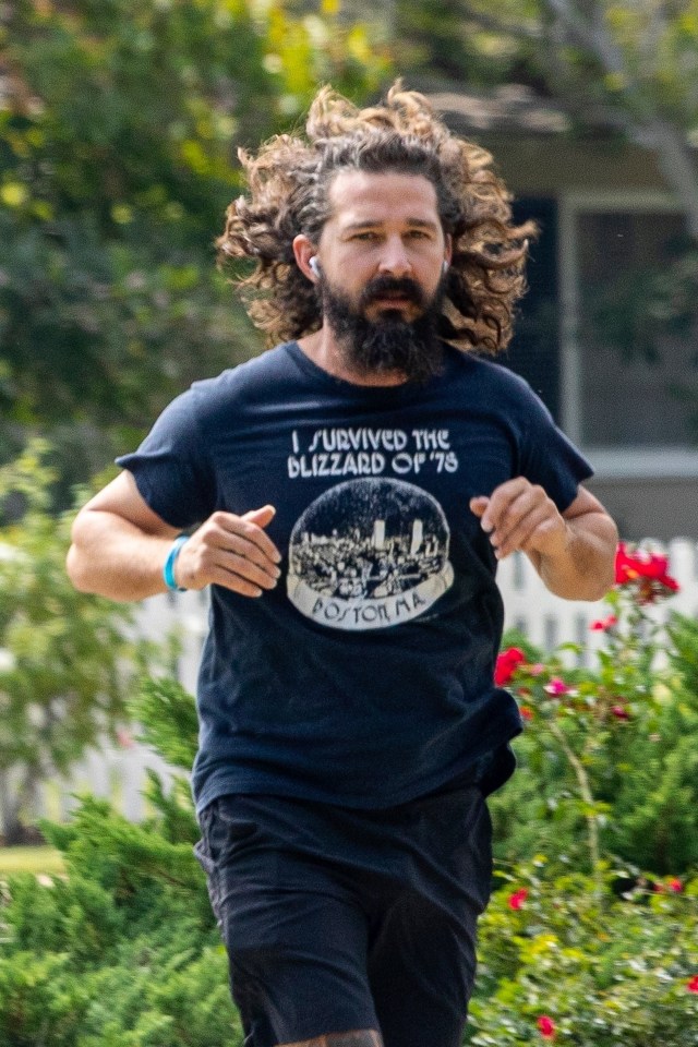 Shia LaBeouf pictured on a run with flowing locks