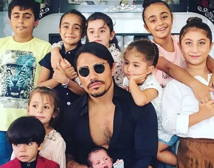 Nusret with the nine kids he called his "family"