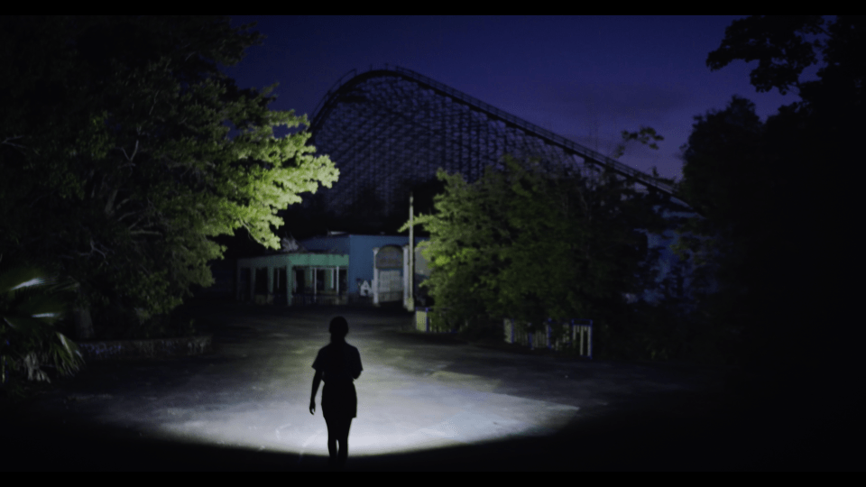 The film explores the dark story of the theme park