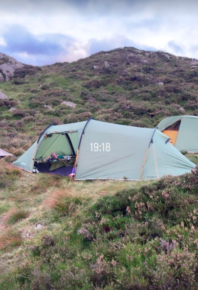 The pair were sleeping outside in a tent last night