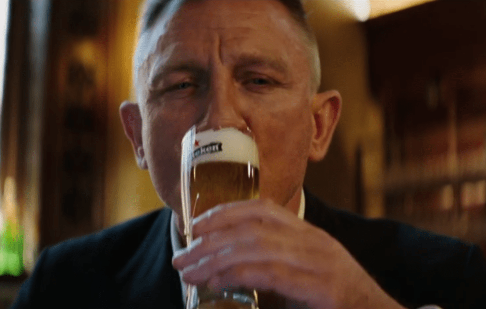 The James Bond star savours his pint of lager and says 'well worth the wait' in the short advert for the movie's sponsor