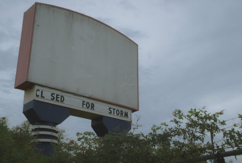 The title of the film comes from the theme park sign which says 'cl-sed for storm'