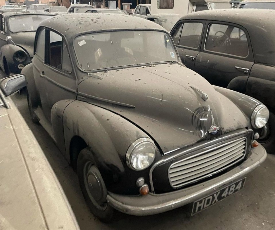 Among the oldest cars to go is a 1952 MG YB, which is being rushed out of the warehouse to make way for a redevelopment project