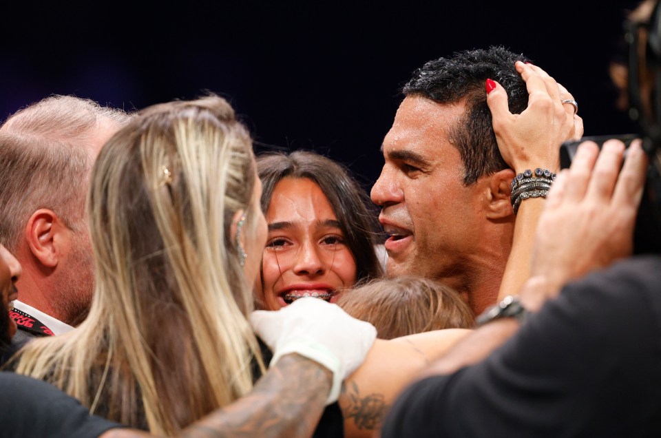 Vitor Belfort celebrates with his family after defeating Evander Holyfield