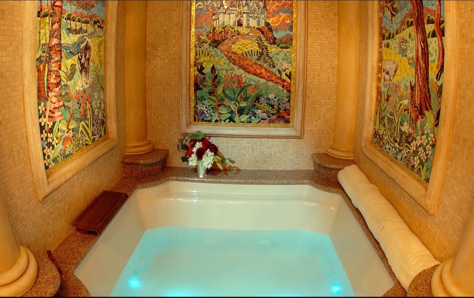 The secret suite has a Jacuzzi surrounded by Cinderella mosaics and a ceiling of twinkling stars