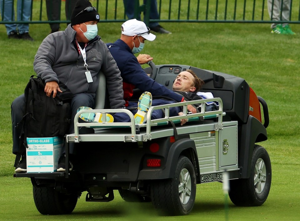 Tom was conscious while on the stretcher as he left the course