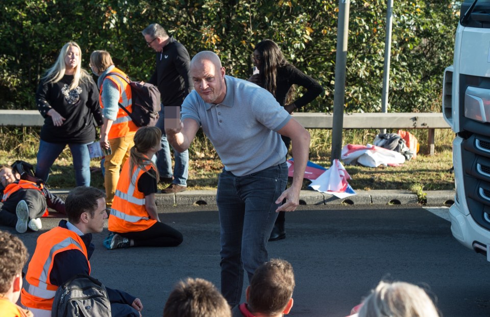 Furious motorists clashed with protestors on the M25