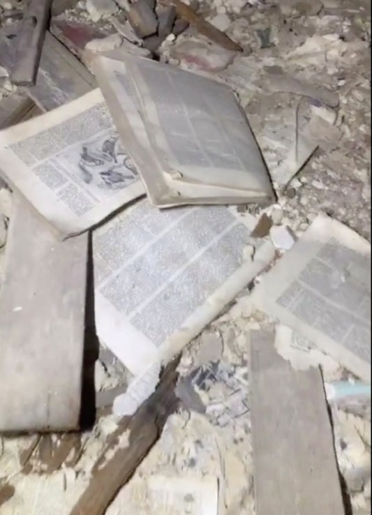 Books were uncovered among the rubble in the secret rooms