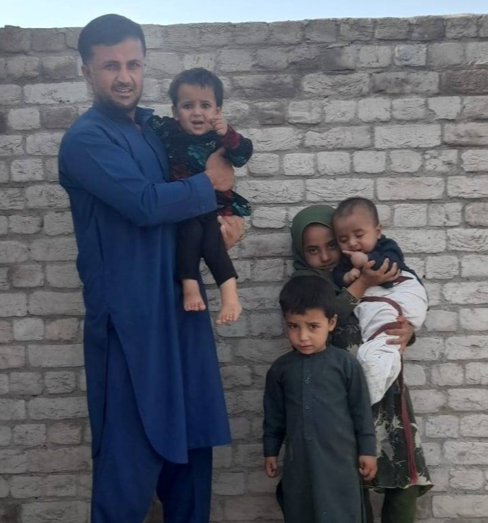 Sidiq Marofahail and his children, Aliya, 1, Tawid, 3, Asia, 6, and Mustafa, four months