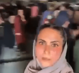 Later, a woman filmed herself allegedly after being rounded up by the Taliban