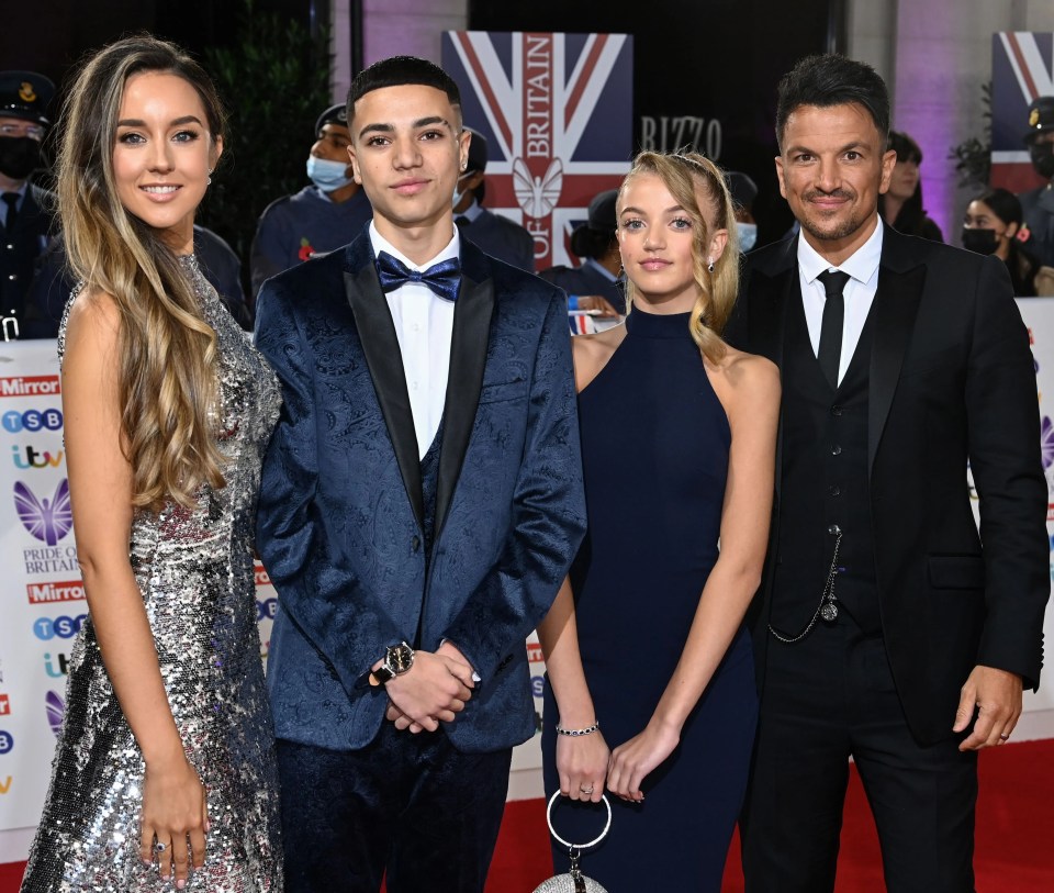 Peter and Emily Andre and his children with Katie Price posed on the red carpet