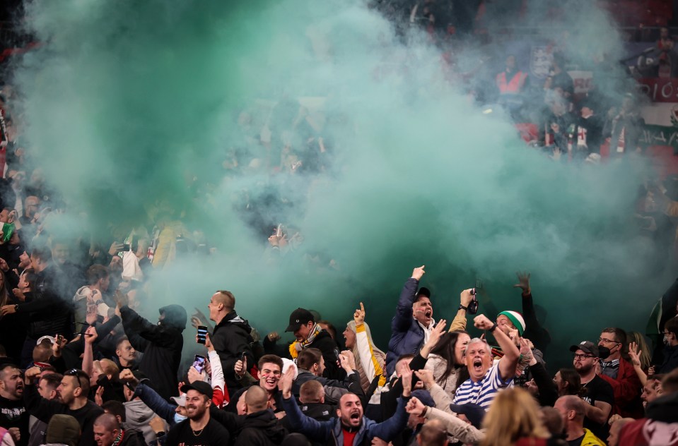 The visiting supporters set off a smoke bomb after their side took the lead