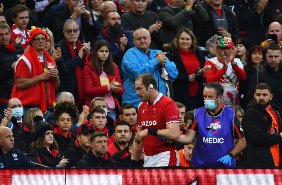 The Wales legend was given a rousing reception as he was helped off by a medic