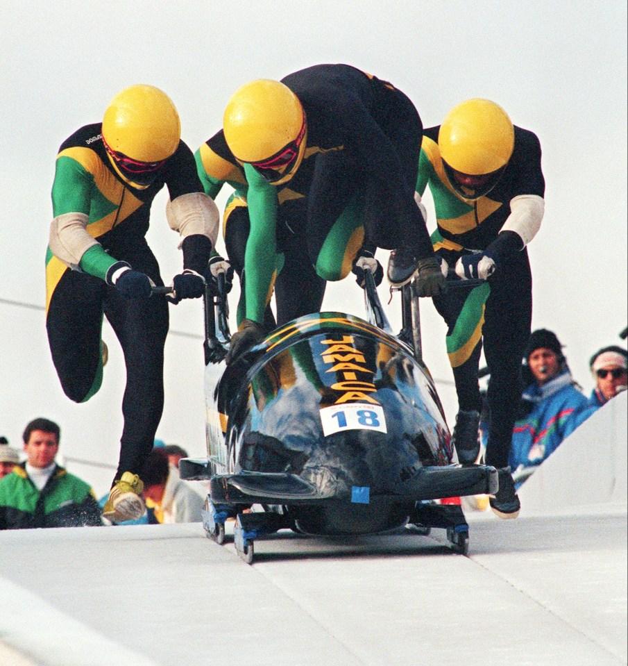 The Jamaican. front, was the driver of the sled which crashed at the 1988 Calgary Winter Olympics