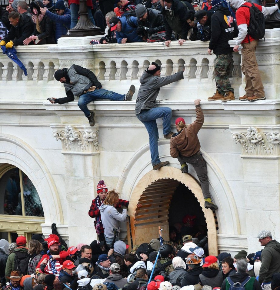 Rioters storm the entrance tunnels to the US Capitol building in Washington D.C.