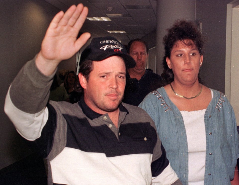 James Dickerson along side his wife Tonda as they leave a court room in 1999