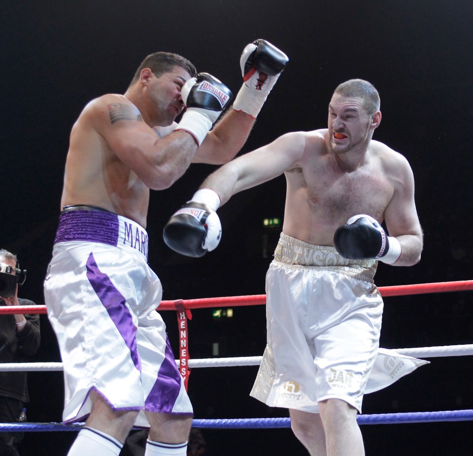 Fury's shorts in this 2011 bout with Marcelo Luiz Nascimento hadn't changed too much from his 2008 debut