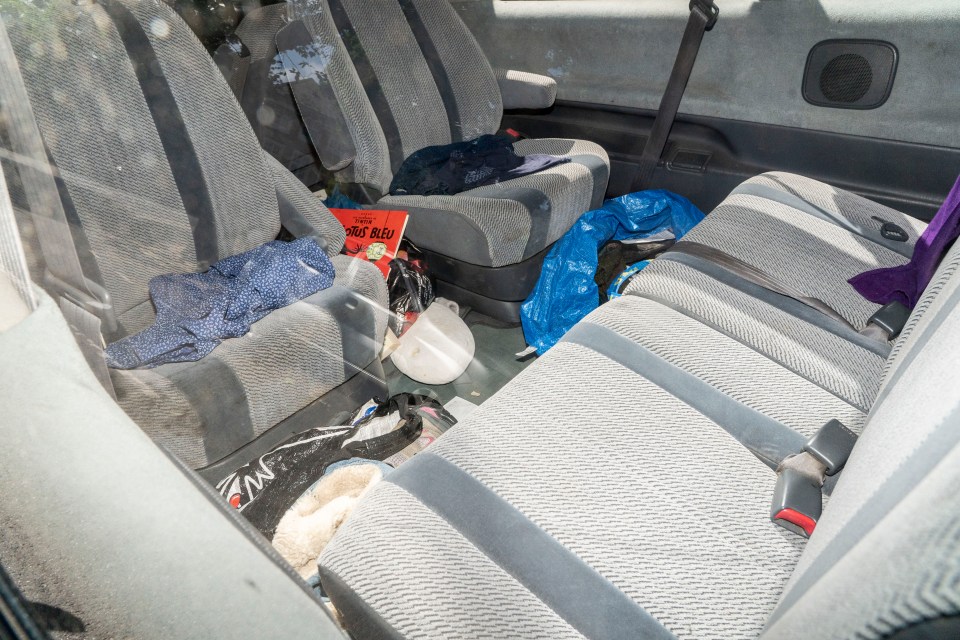 The mess and dirt in the back of Johnson's Previa minivan