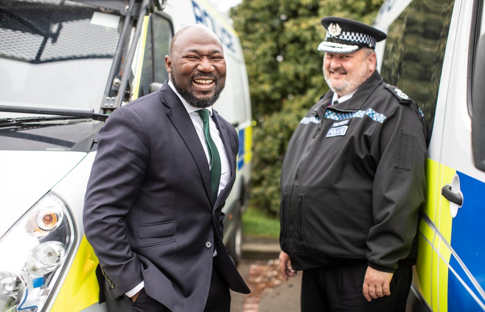 Mr Akinbusoye, pictured here with Chief Constable Garry Forsyth, was elected to the post this year