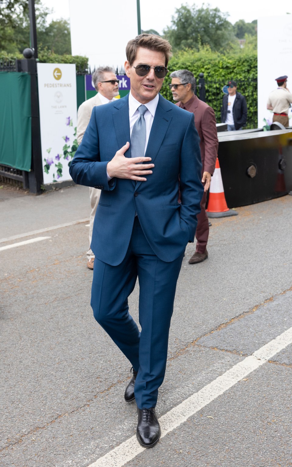 Tom didn't appear to be carrying excess weight during his visit to Wimbledon in July 2021