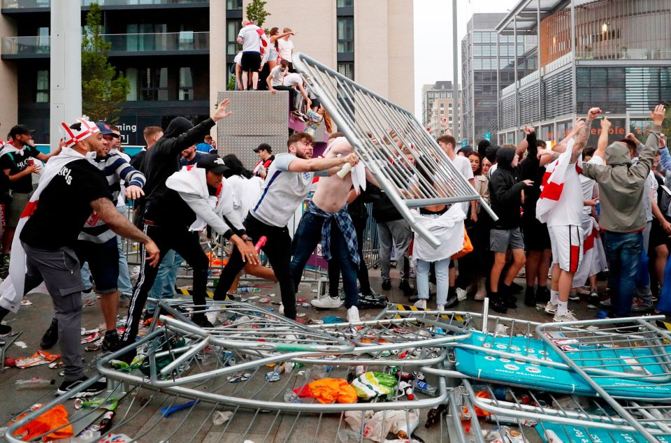 England fans brought down barriers before some broke into the stadium without a ticket