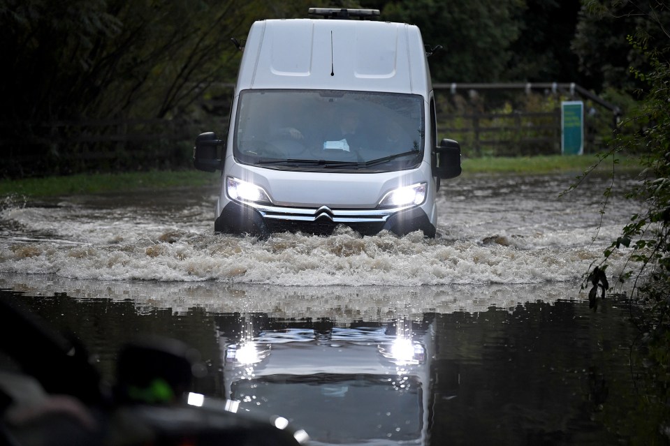 A badly flooded road near Daisy Nook Country Park in Failsworth, Greater Manchester