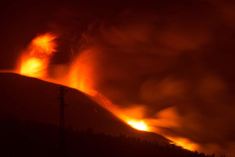 Molten lava spewing out of the volcano