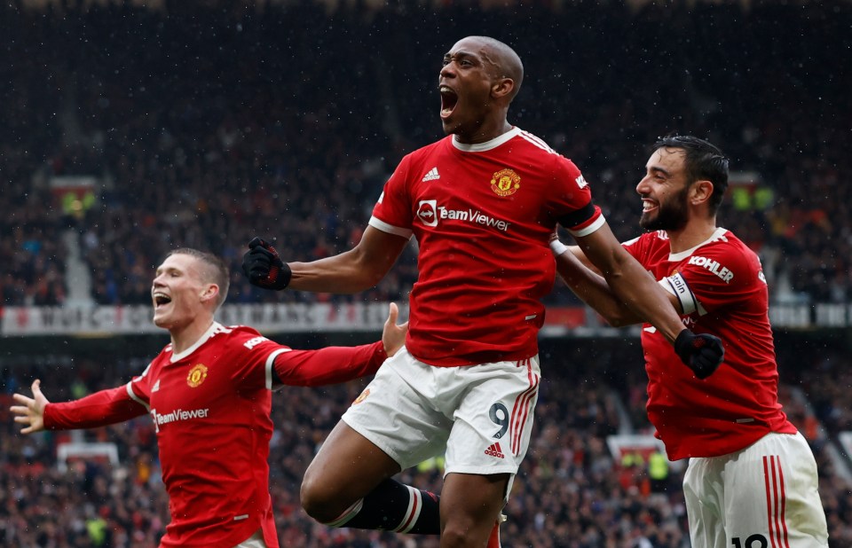 French striker Martial wheeled away in delight after scoring his first of the season