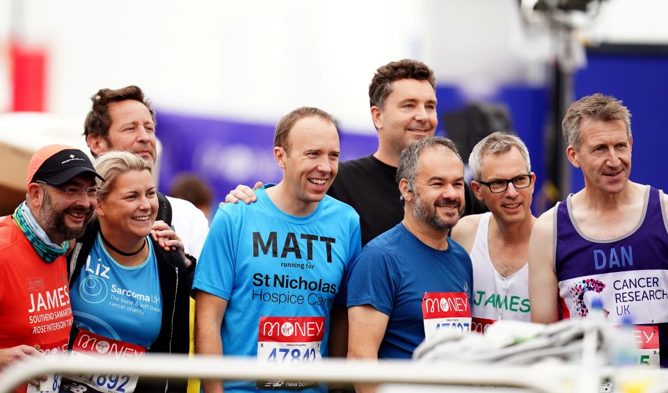 The former-Health Secretary is seen posing with other runners