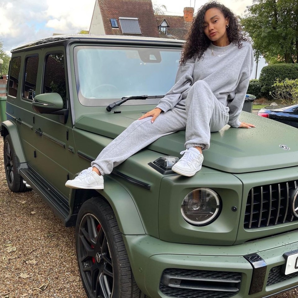 Leigh-Anne looked stunning as she posed on top of her new car