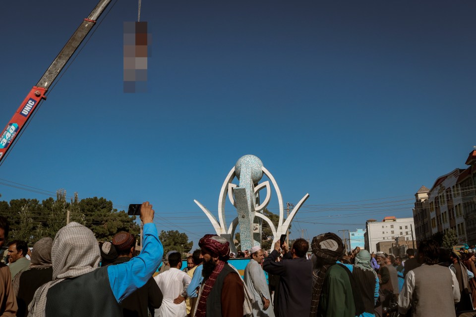 On September 25 similarly horrendously pictures came out of men hanging from cranes