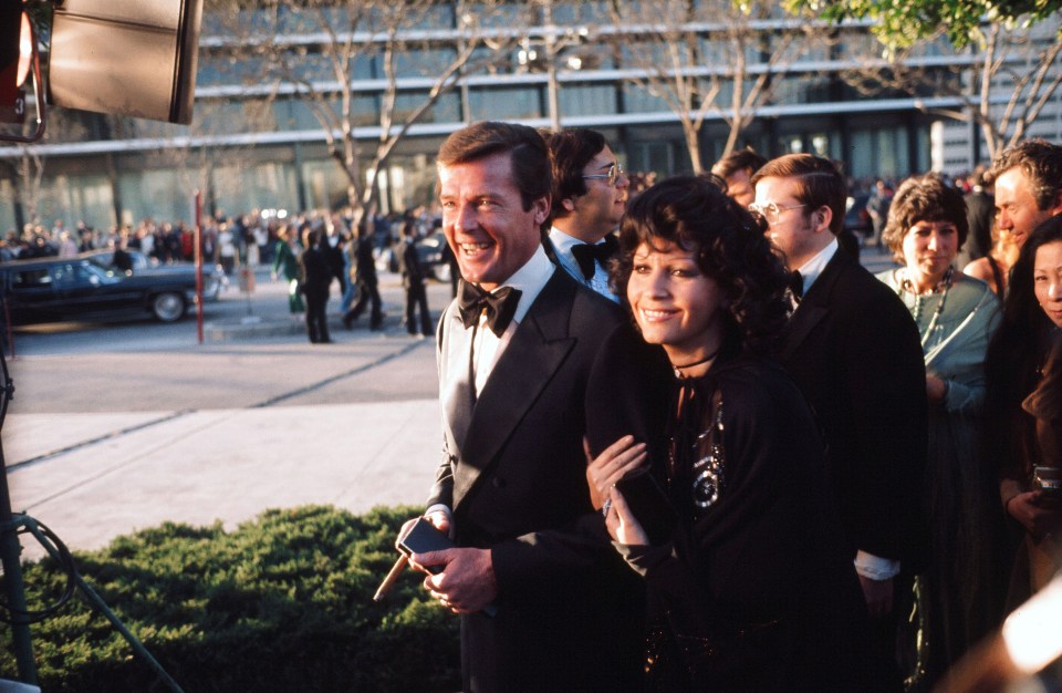 Roger Moore and Luisa Mattioli arrive at the Academy Awards in Los Angeles