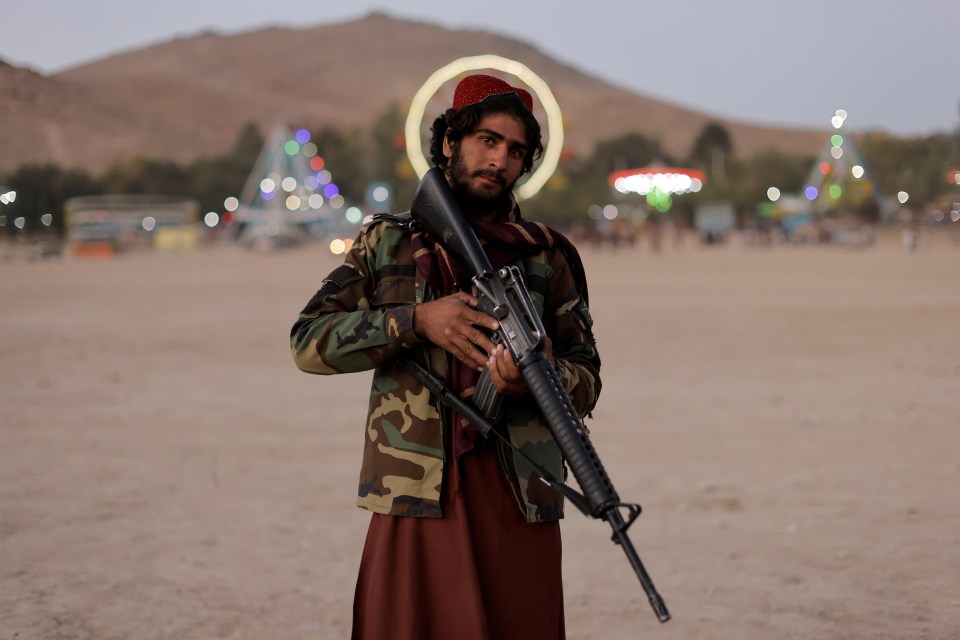 And one Taliban fighter poses as if he had an angelic halo