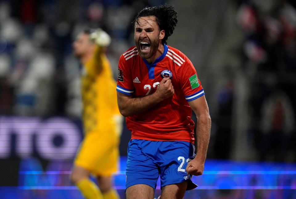 Brereton Diaz celebrates his goal for Chile against Paraguay.