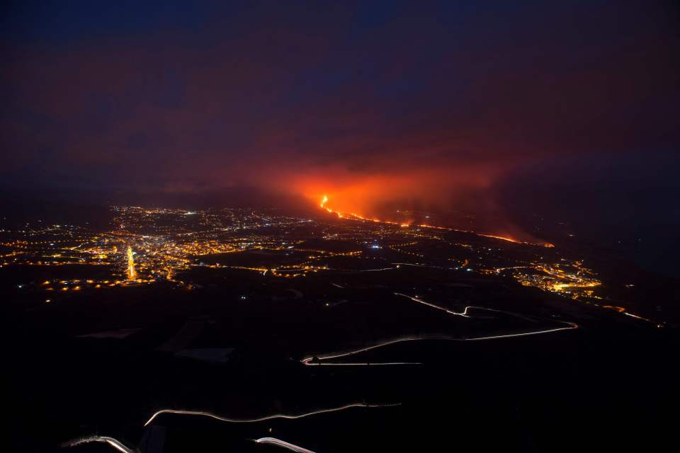 Part of the volcano's cone collapsed on Saturuday, sending new rivers of lava pouring down the slopes towards an industrial zone