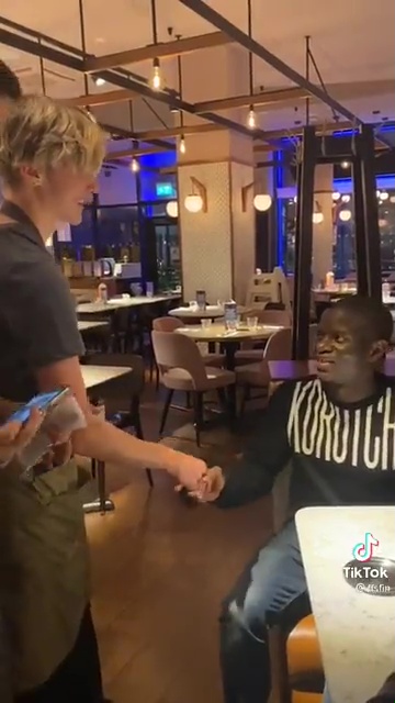 He shook hands with the waiter as he made the staff's night