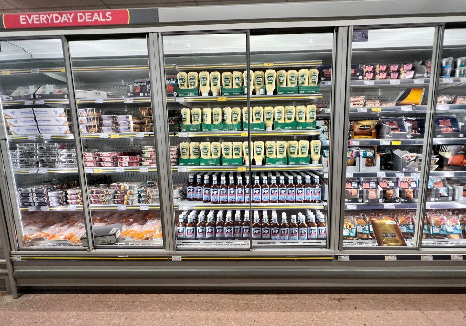 Supermarkets tried to disguise empty shelves and chiller cabinets by filling them with random items they do have — including HP sauce and salad cream