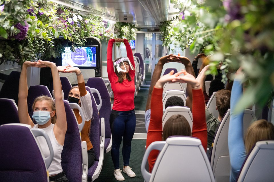 Heathrow Express passengers during a yoga class yesterday