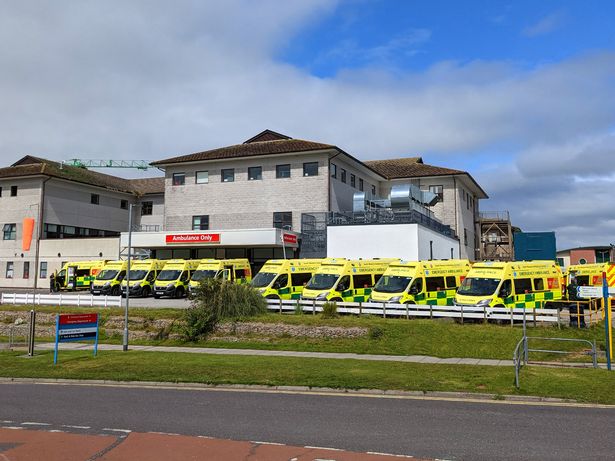 Ambulances were left queueing outside the Royal Cornwall Hospital as they struggle to cope with the influx of patients