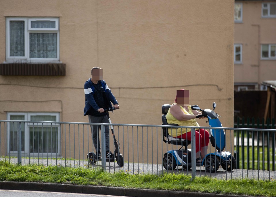 Locals are seen in the estate in Wales