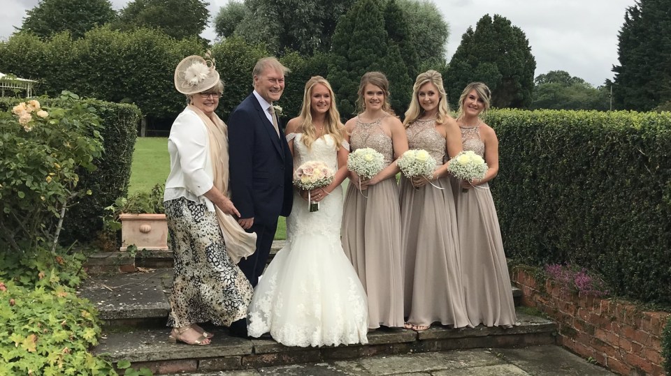 Sir David Amess with his wife Julie at daughter Alexandra's wedding with his other girls as bridesmaids in August